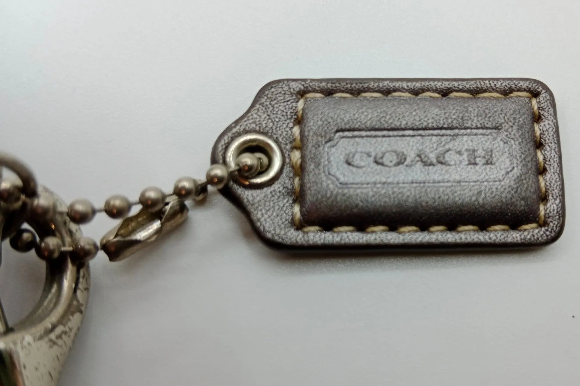 COACH WRISTLET GRAY LEATHER SLIVER HARDWARE